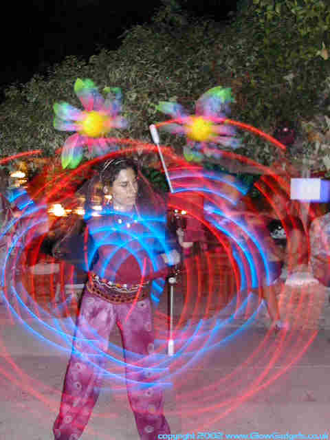 Glow poi spinner, long exposure trails